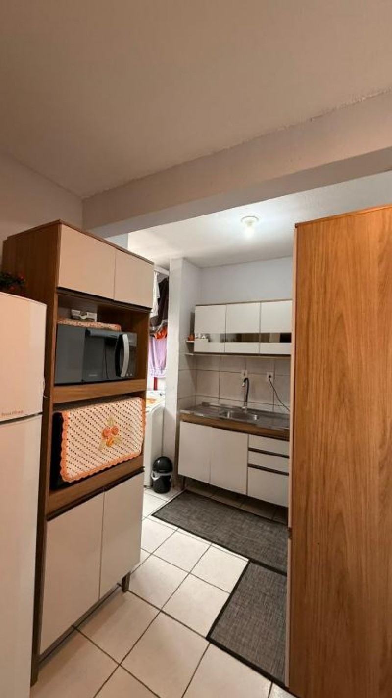 APARTAMENTO EM CONDOMÍNIO