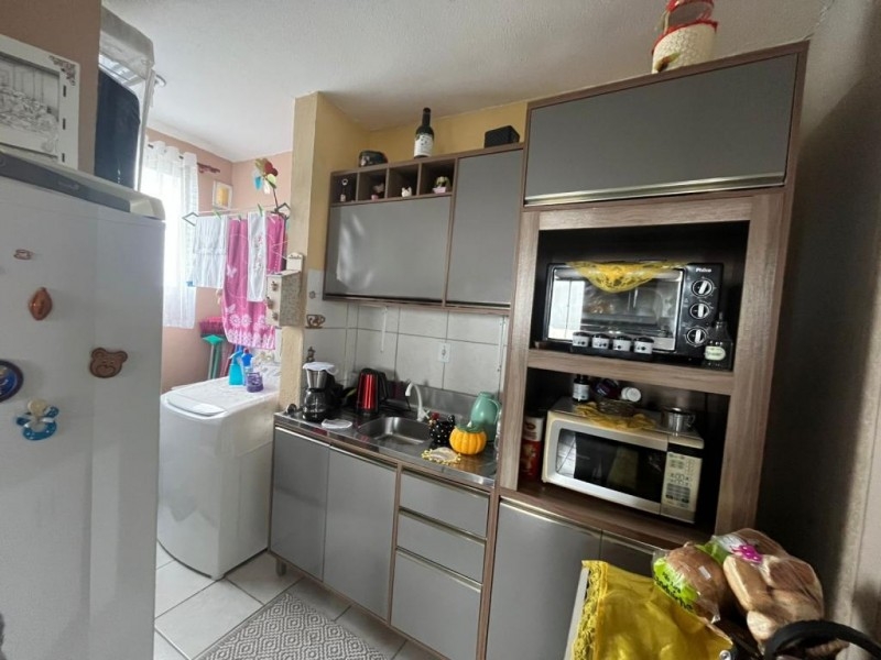 APARTAMENTO EM CONDOMÍNIO FECHADO